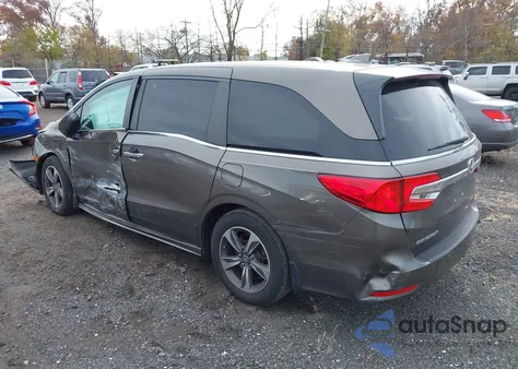 2018 Honda Odyssey Touring z USA, uszkodzony, nr VIN 5FNRL6H8XJB066893